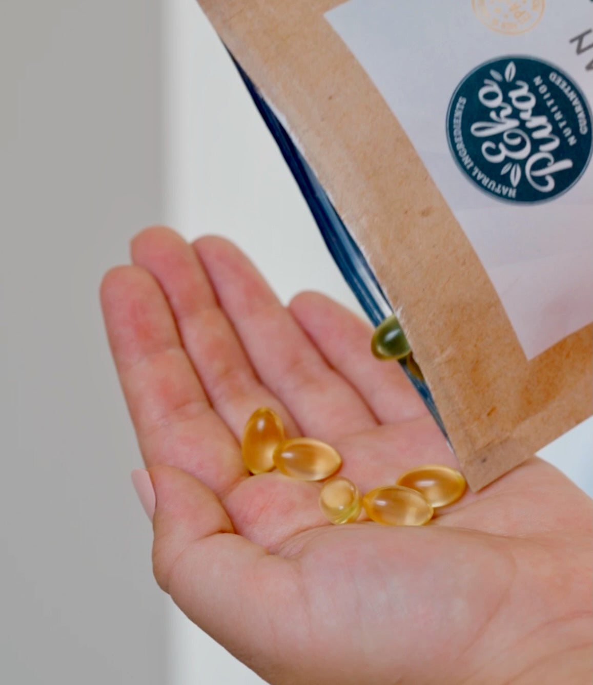 EKOPURA Vegan Omega3 DHA EPA Capsules in hand