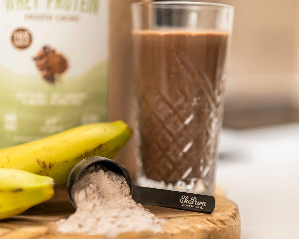 Ekopura whey cacao poeder met scoop